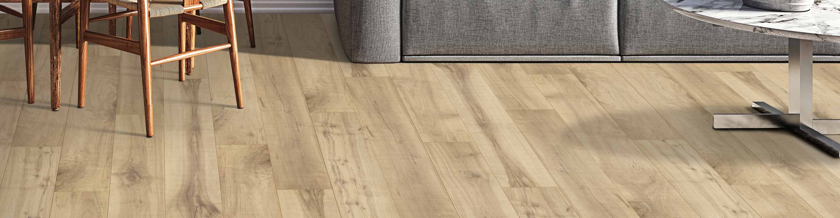 Wood-look vinyl plank flooring under furniture.